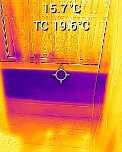 Thermal image showing temperature reading of 70.2°F with colour gradient.
